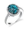 18Kt White Gold Halo Style Oval Blue Zircon and Diamond Ring