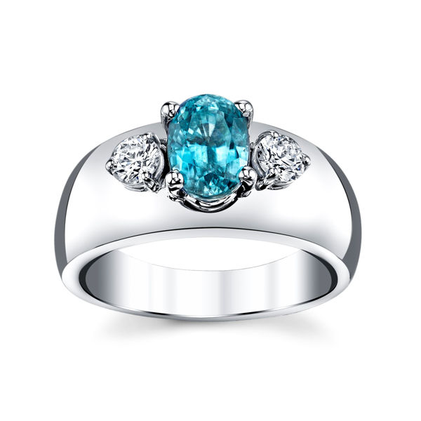 14Kt White Gold Classic Three Stone Design of Diamonds and Oval Blue Zircon Ring