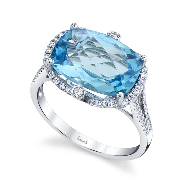 14kt White Gold Enchanting Blue Topaz and Diamond Halo Ring