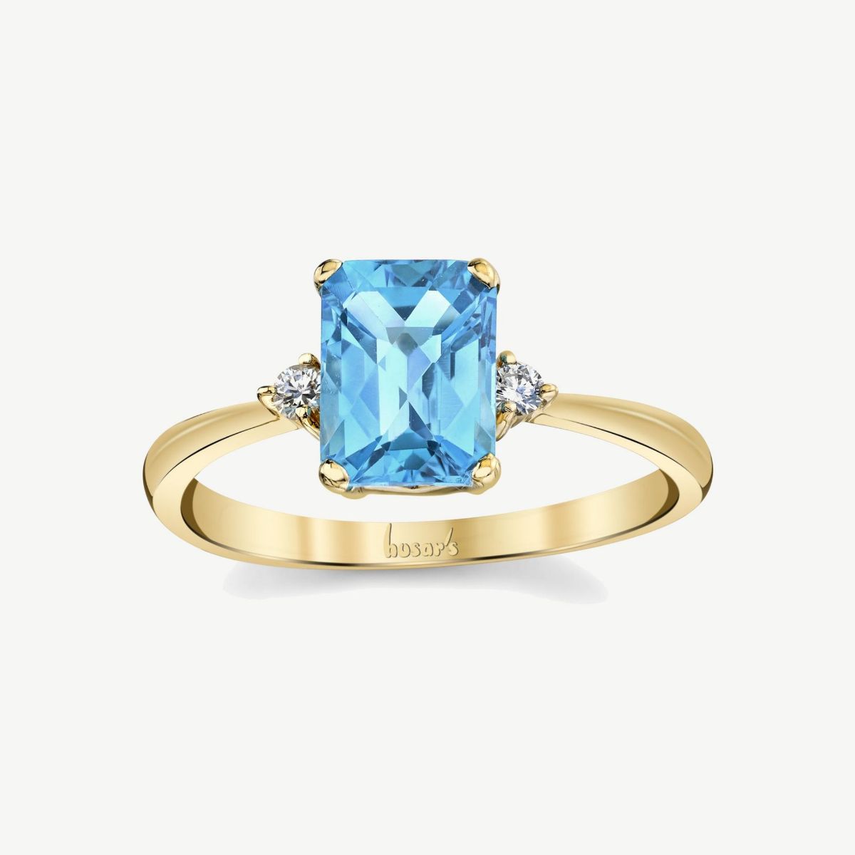 Picture of 14K Gold Blue Topaz Three Stone Ring with Emerald Cut Center and Pinch Shank