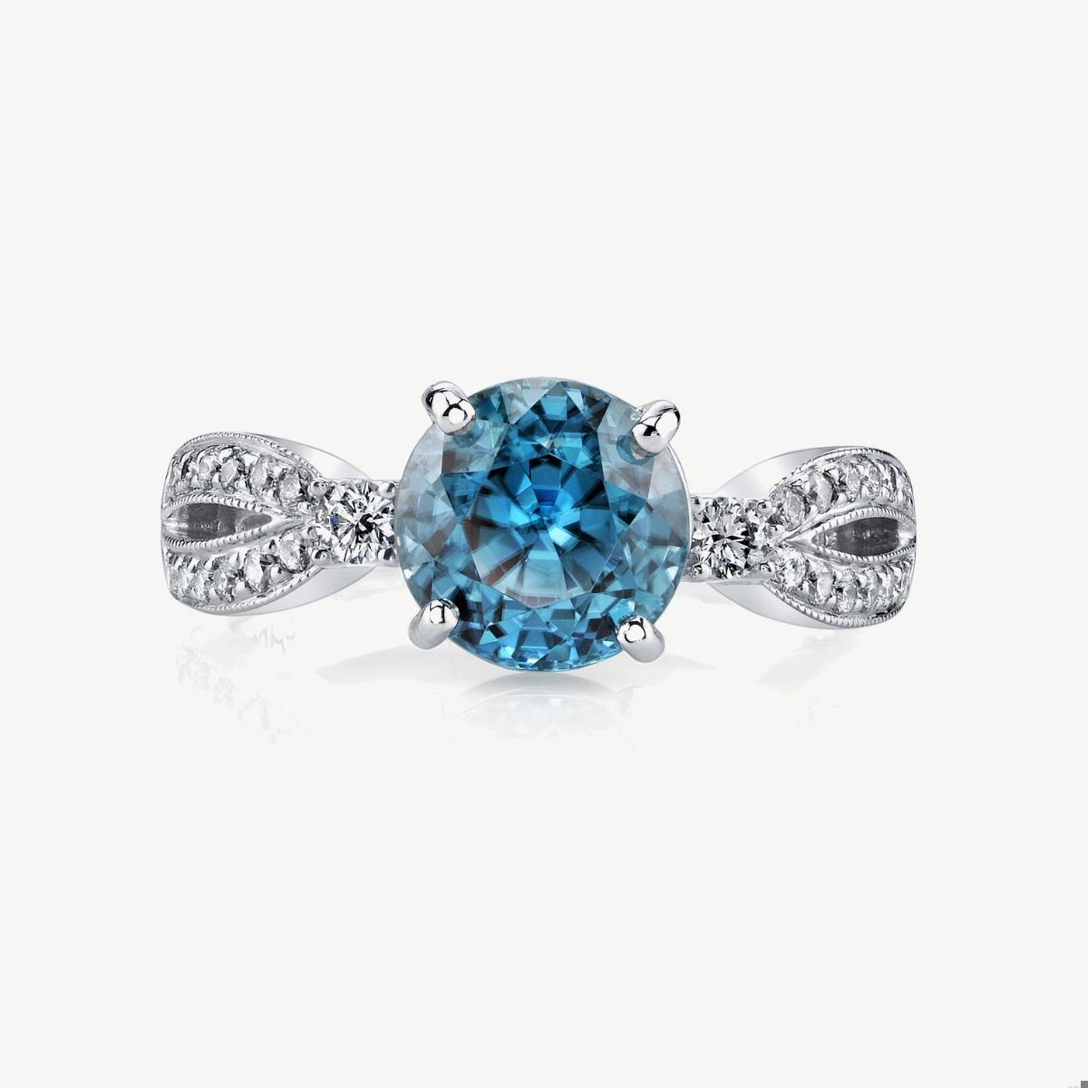 Picture of 14K White Gold Blue Zircon Ring with Prong Set Center and Split Rows of Diamonds, Milgrain Edges