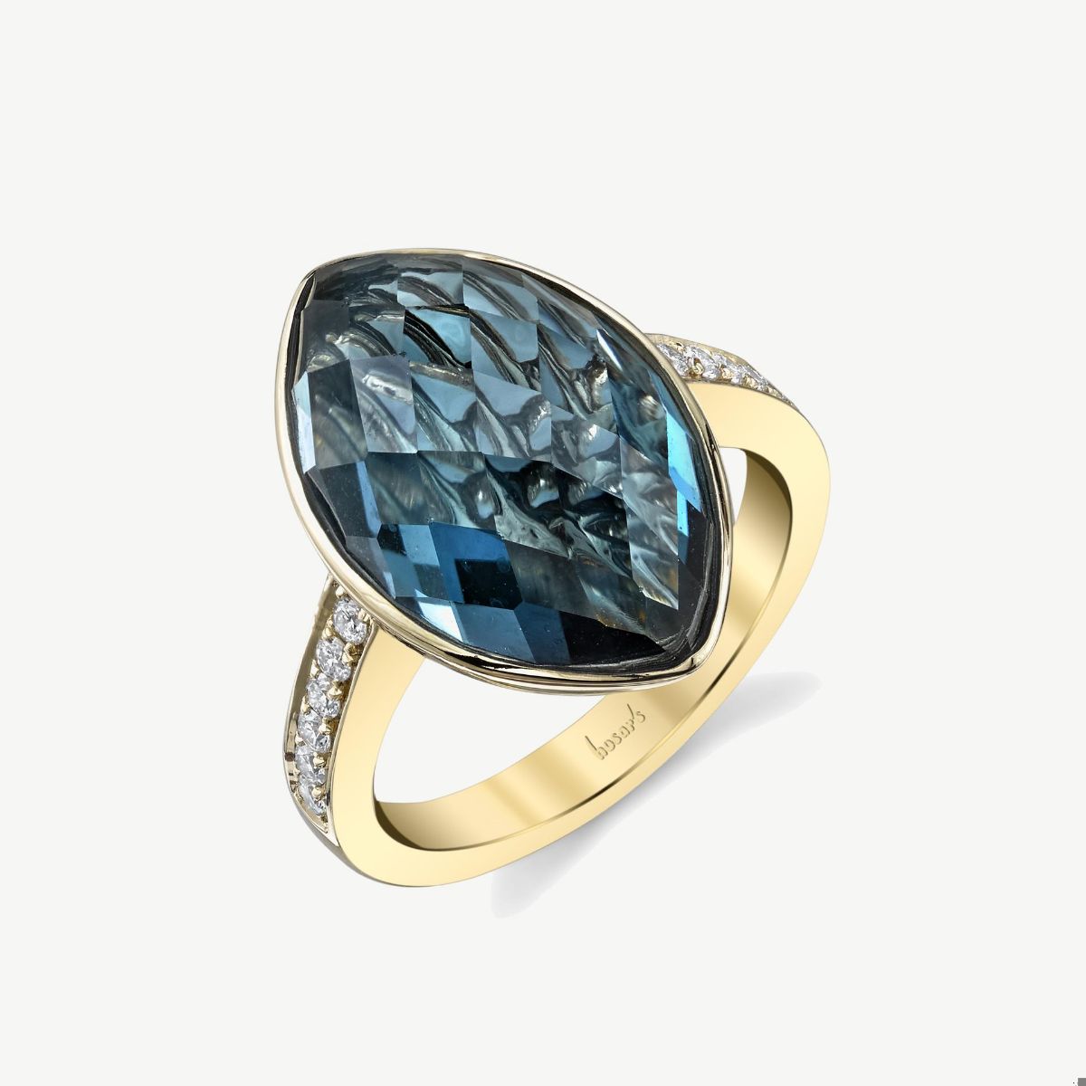 Picture of 14K Yellow Gold Blue Topaz Marquise Cut Ring with Bezel Setting and Straight Shoulders