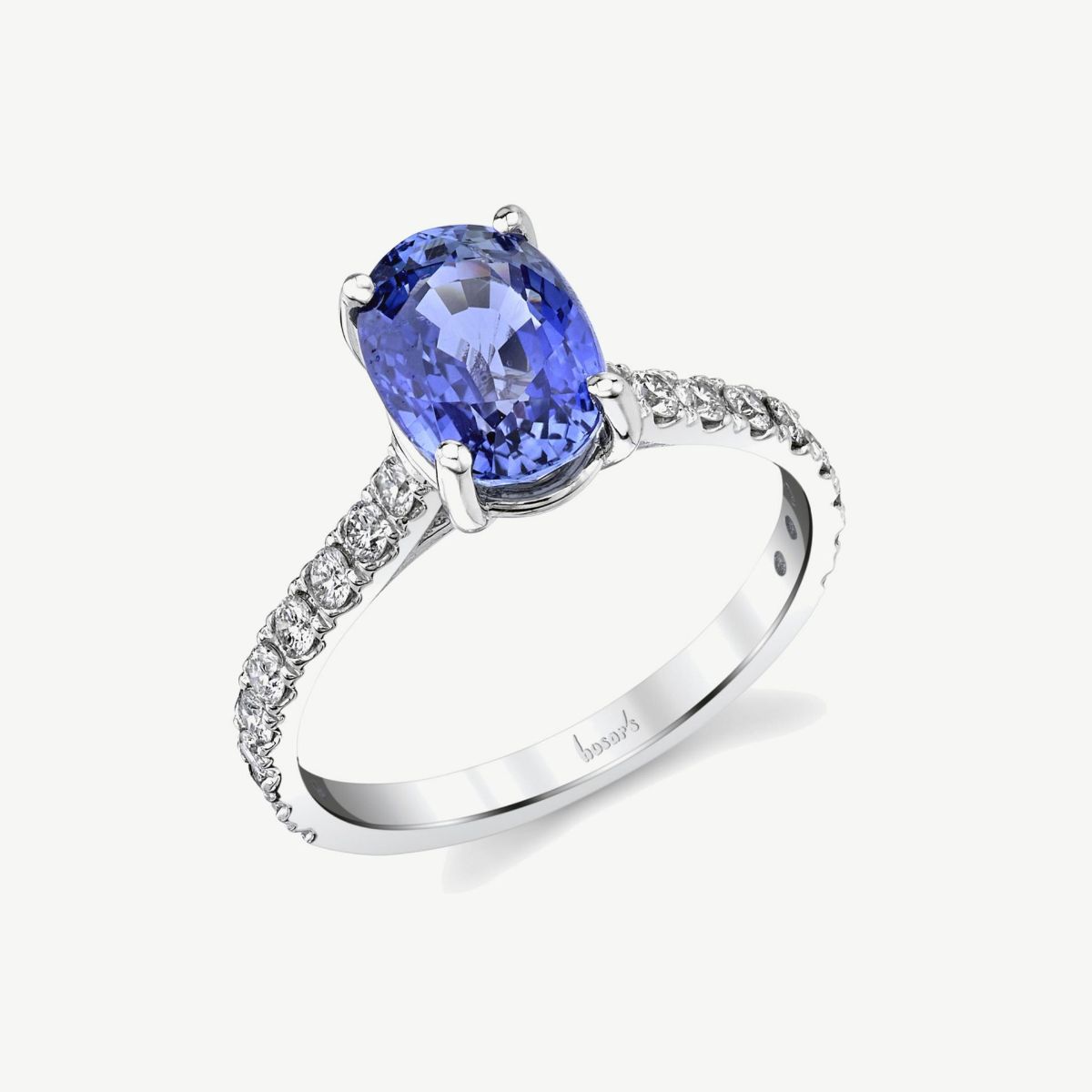 Picture of 14K Gold Blue Sapphire Cathedral Ring with Oval Center Prong Set Rounds on Shank