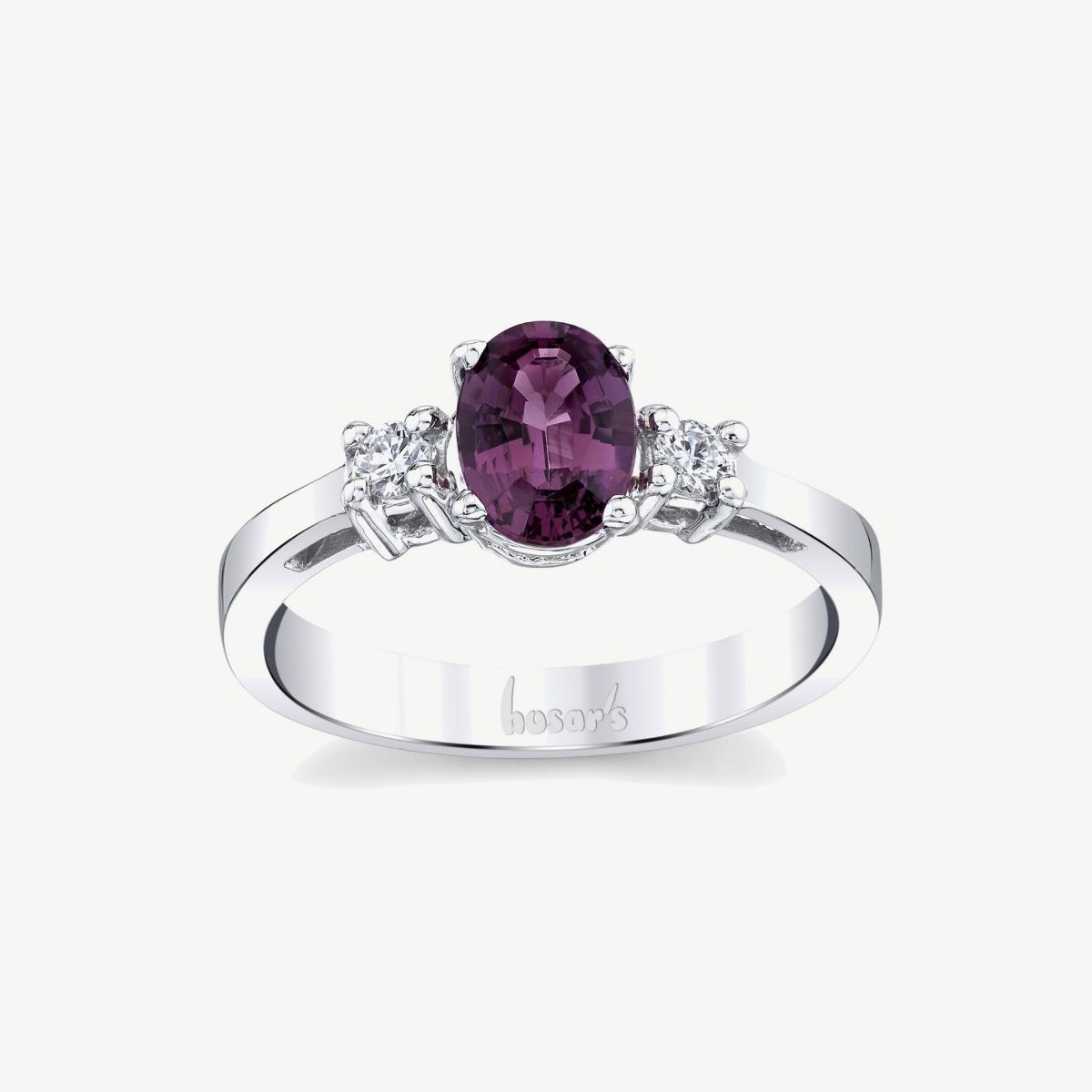 Picture of 14K Gold Rhodolite Garnet Three Stone Ring with Prong Set Rounds and Flat Shoulders